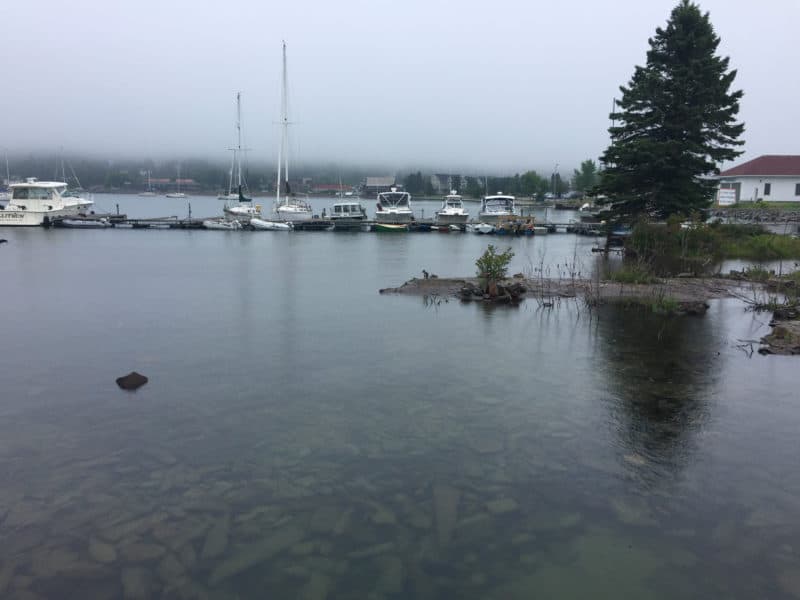 North Shore Road Trip: Lake Superior 11 Grand Marais harbor on a foggy day. Grand Marais, Minnesota is a cute little harbor town on the North Shore of Lake Superior.