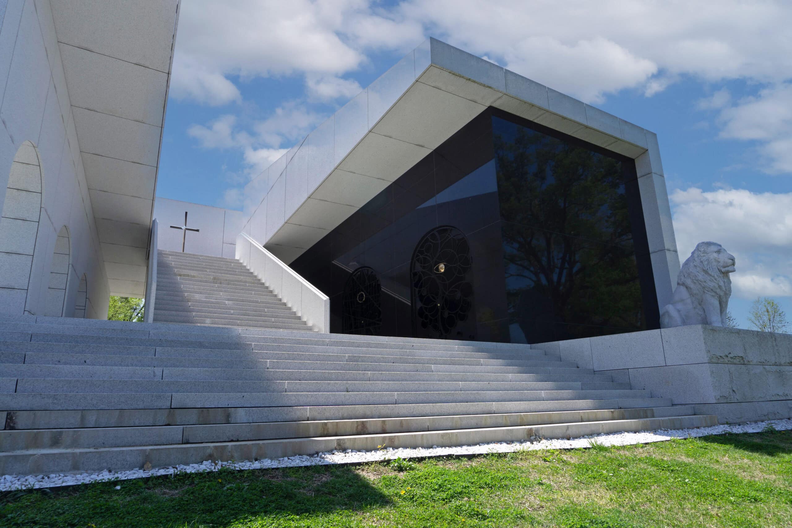 The Cascade Mausoleum in Bellefontaine Cemetery, St. Louis, is a modern mausoleum made of white granite and polished black granite enclosing the crypt