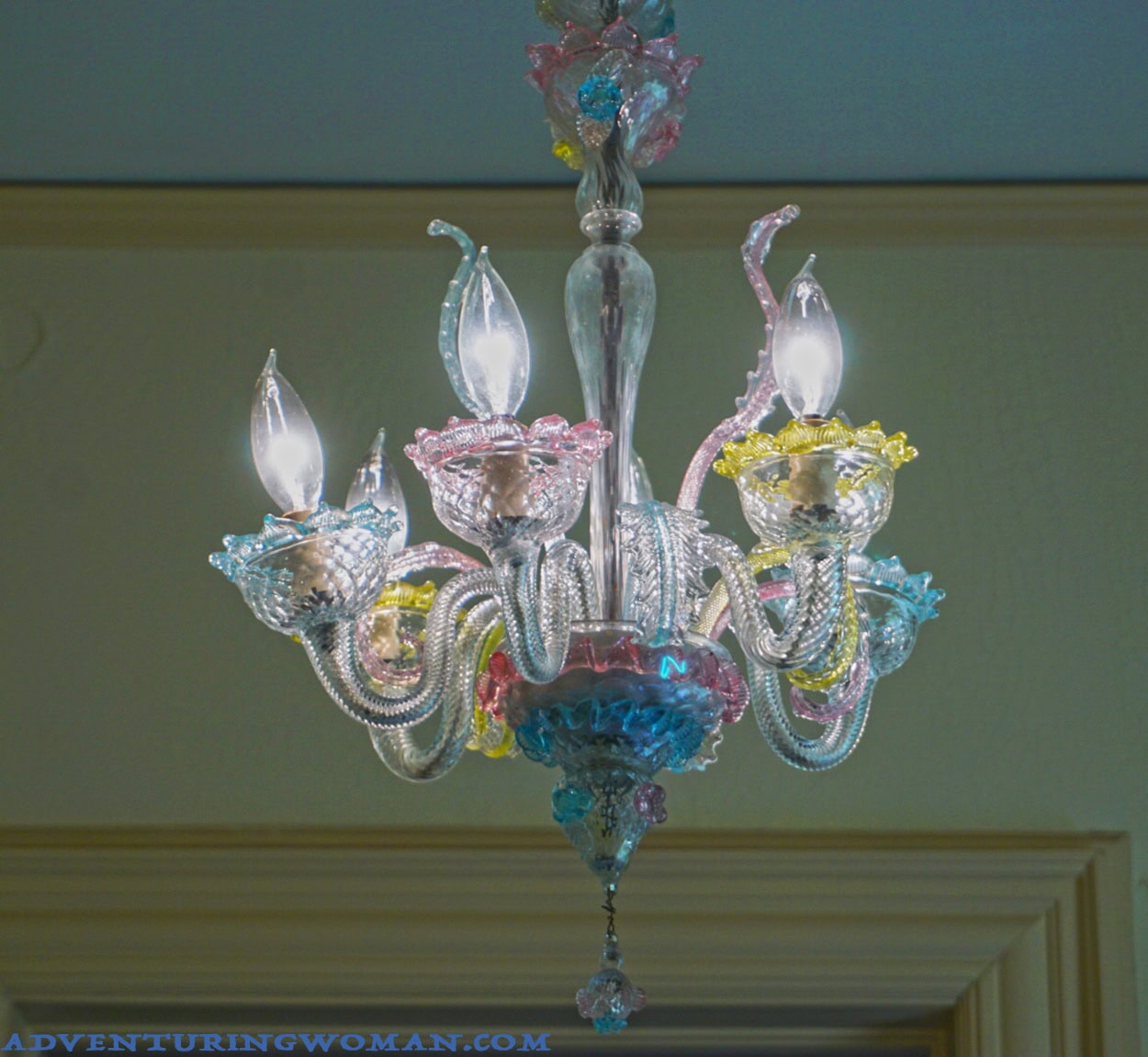 A delicate Venetian glass chandelier with pastel blues, pinks and yellows hangs in the second-floor suite's bathroom of the Overholser mansion in Oklahoma City. The suite belonged in later years to daughter Hentry Ione.